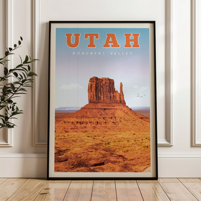 A framed poster of Monument Valley, a famous landmark in Utah, USA.