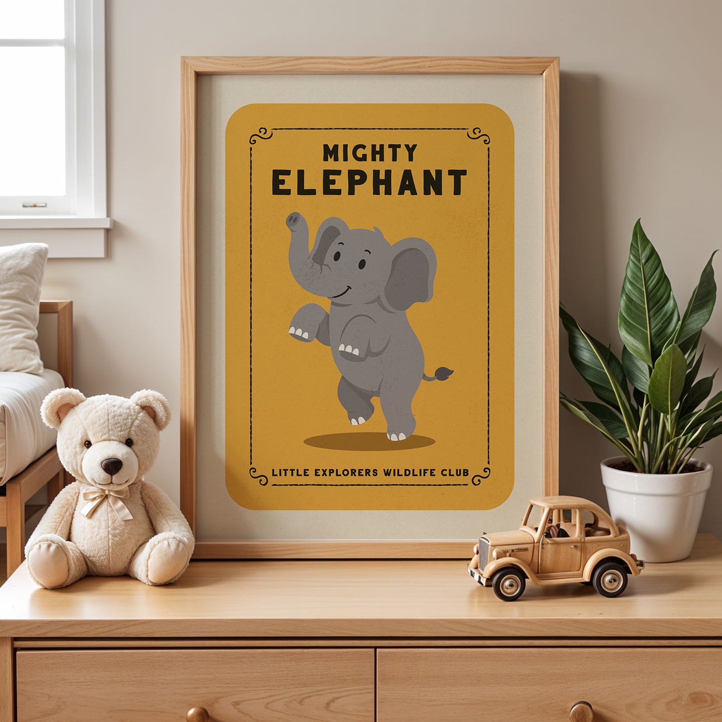 a framed poster of a cartoon elephant, a teddy bear, and a toy truck on a wooden dresser.