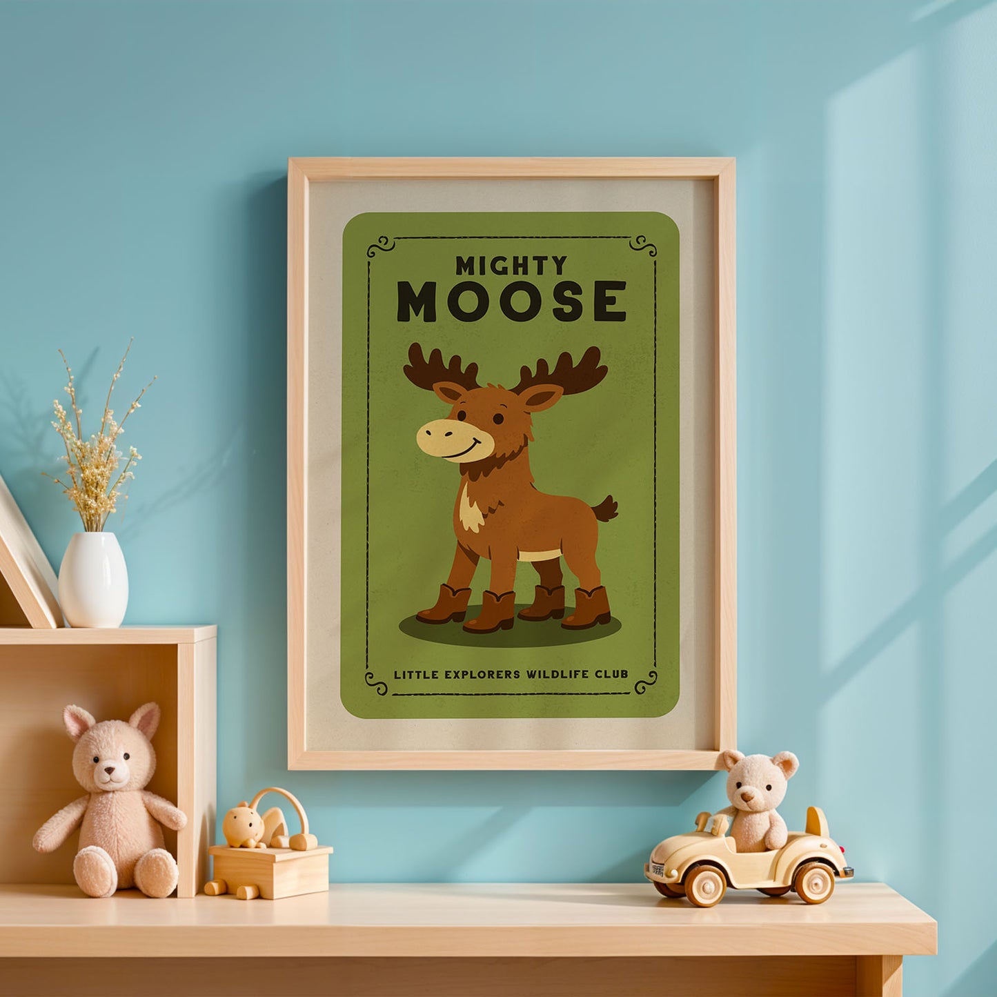 a framed poster of a moose on a wall, with a wooden shelf below it holding various toys and a vase.