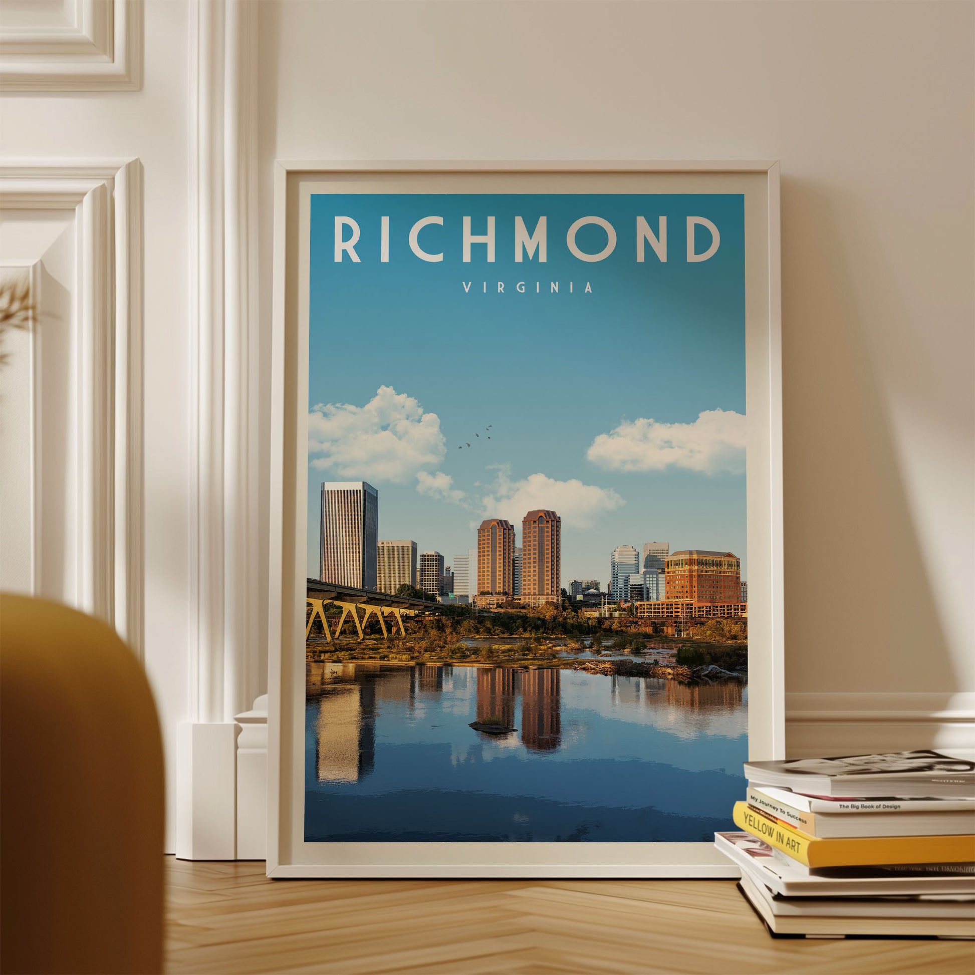 A framed poster of the city of Richmond, Virginia, with a view of the city skyline and a body of water in the foreground.
