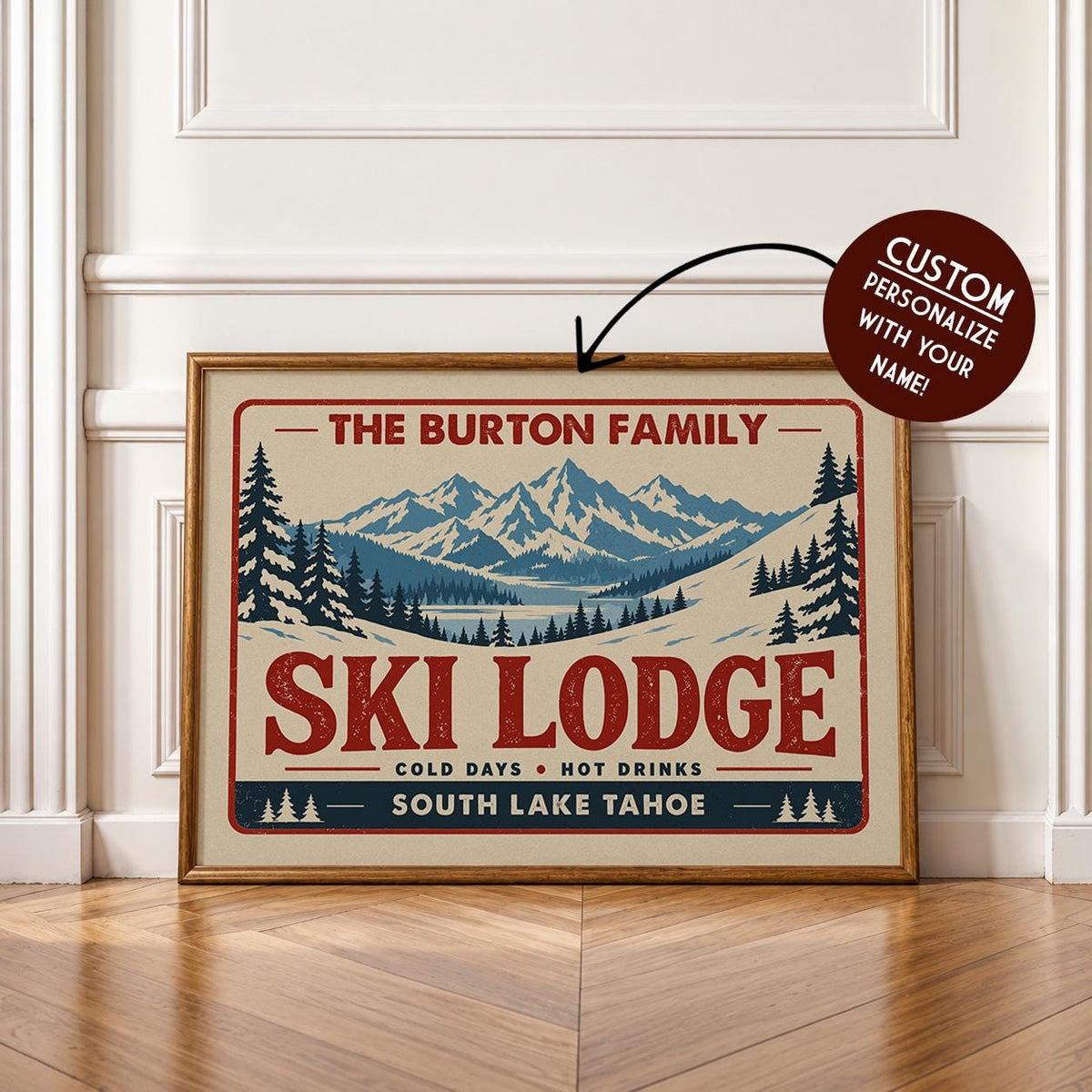 A framed poster advertising "The Burton Family Ski Lodge" with a mountain landscape and pine trees.