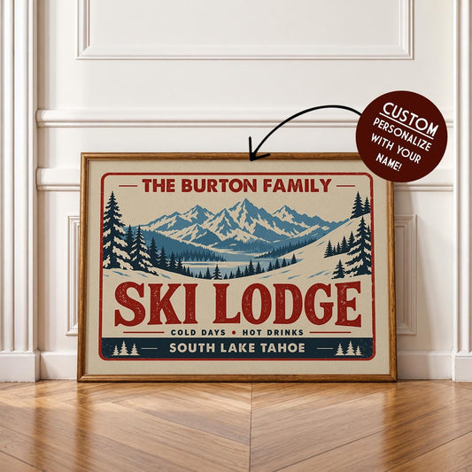 A framed poster advertising "The Burton Family Ski Lodge" with a mountain landscape and pine trees.