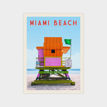 A colorful lifeguard tower on the beach, with the text "MIAAMI BEACH FLORIDA" displayed above it.