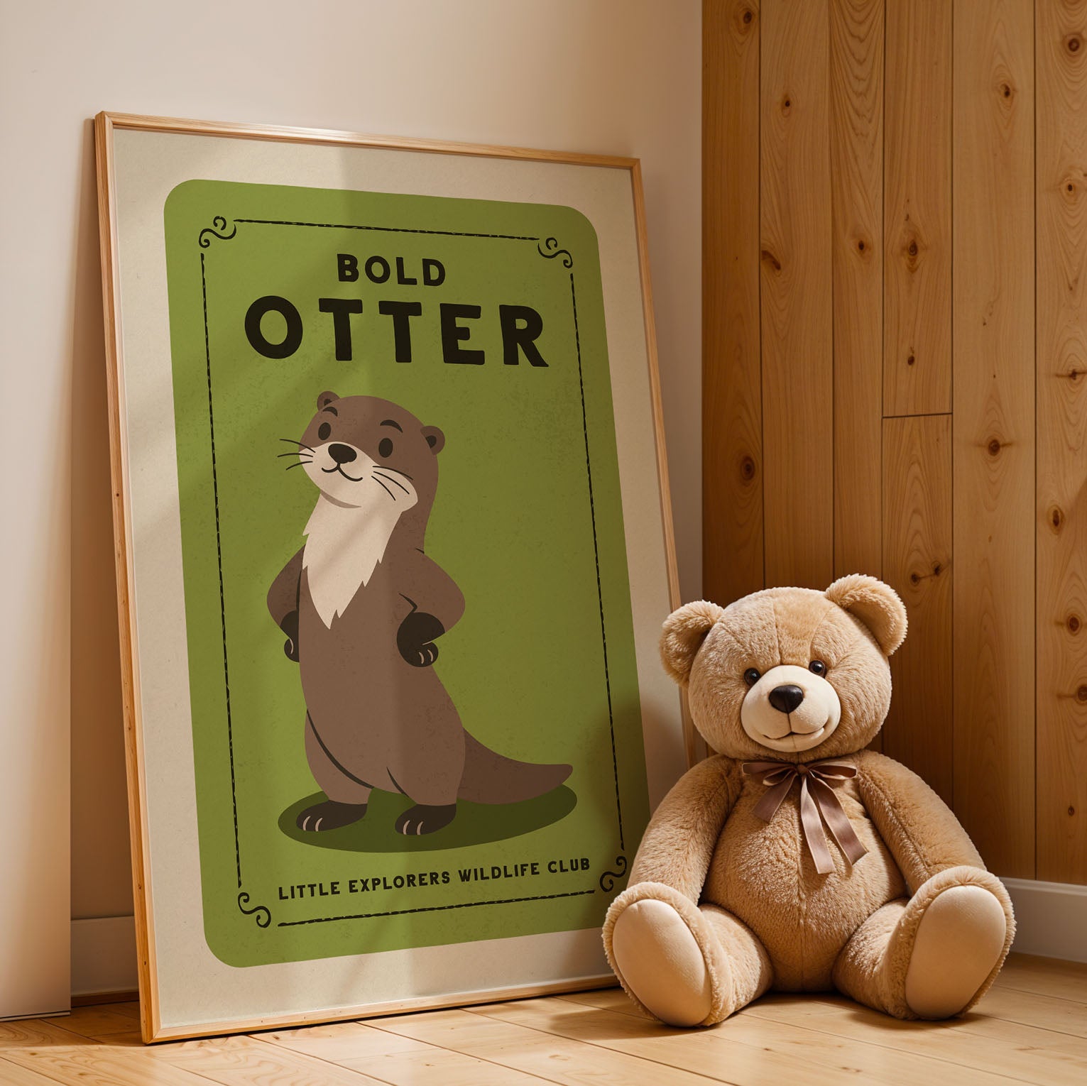 A framed poster of an otter is leaning against a wooden wall, with a teddy bear sitting next to it on the floor.