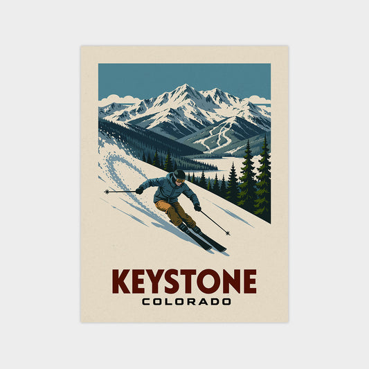 A vintage-style poster depicting a skier descending a snowy mountain slope, with the text "KEYSTONE COLORADO" prominently displayed.
